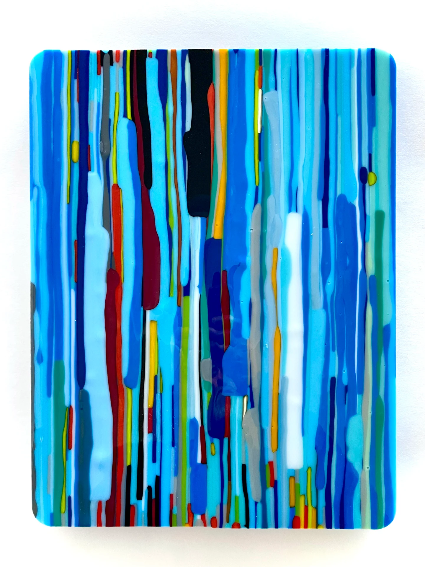 Blue-dominant glass panel with vertical bands of colour against white
