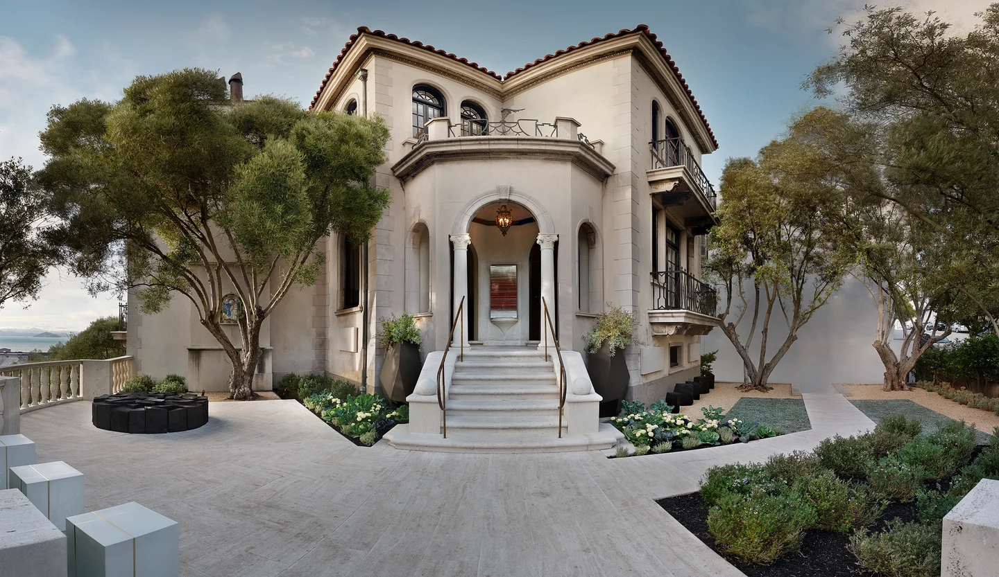 Exterior of the 2016 San Francisco Decorator Showcase, with a pale building, central stairs and landscaped forecourt